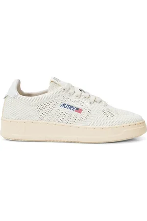 Autry Schoenen, Dames, Wit, 36 EU, Katoen, Witte geperforeerde stoffen sneakers