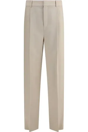 Saint Laurent Broeken, Heren, , M, Wol, Elegante Wol Carotte Broek met Zakken