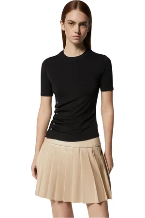 John Richmond Tops, Dames, Zwart, XS, Zwarte aansluitende top met zijdetails en beige geplooide rok