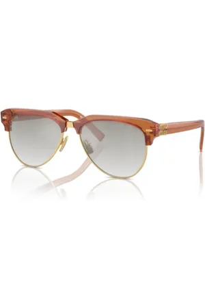 Miu Miu Accessoires, unisex, Bruin, ONE Size, Stijlvolle 09Zs Sole Zonnebril