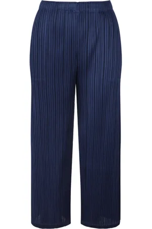 Issey Miyake Broeken, Dames, Blauw, L, Leer, Geplooide Wijde Pijp Broek Februari Kleuren