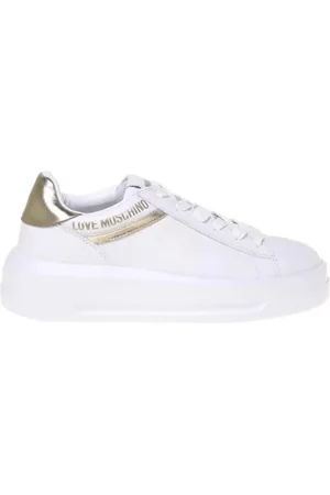 Moschino Schoenen, Dames, Wit, 36 EU, Leer, Witte en Gouden Sneakers voor Vrouwen