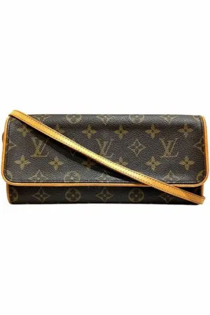 LOUIS VUITTON Pre-owned, Dames, Bruin, ONE Size, Pre-owned Canvas clutches