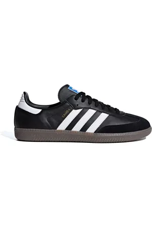 adidas Schoenen, Dames, Zwart, 45 1/3 EU, Leer, Zwarte leren sneakers gouden details