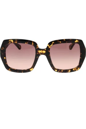 Chloé Accessoires, unisex, Bruin, ONE Size, Stijlvolle zonnebril met uniek ontwerp