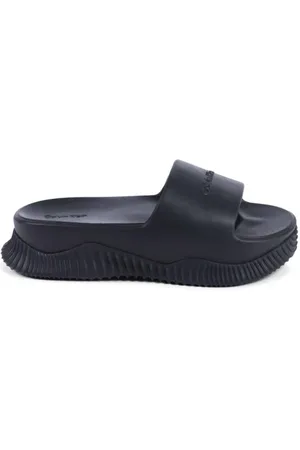 Calvin Klein Schoenen, Dames, Zwart, 37 EU, Zwarte Slide Sandalen Lichtgewicht Kussengevoel