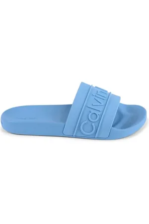 Calvin Klein Schoenen, Dames, Blauw, 39 EU, Blauwe Reliëf Slide Sandalen