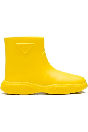 Prada Schoenen, Dames, Geel, 36 EU, Gele Enkellaarzen met Relief Logo