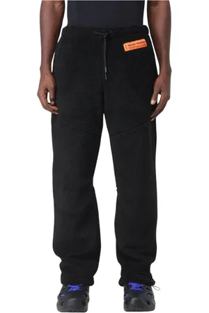 Heron Preston Broeken, Heren, Zwart, S, Polyester, Gezellige Zwarte Fleecebroek Relaxte Pasvorm