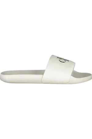 Calvin Klein Schoenen, Dames, Wit, 38 EU, Stijlvolle Logo-Print Slippers