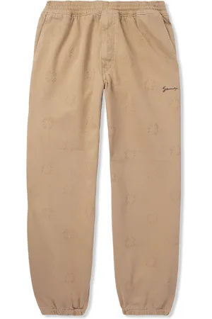 Givenchy Tapered Appliquéd Logo-Jacquard Cotton-Blend Twill Trousers - Men - - IT 46