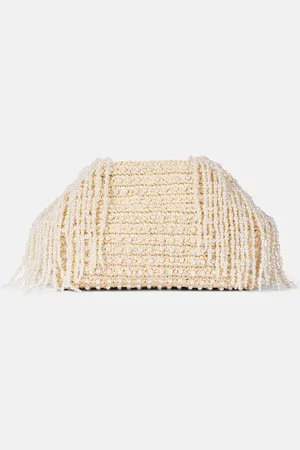 Self-Portrait Embellished fringed raffia clutch