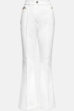 Patou Embellished high-rise flared jeans