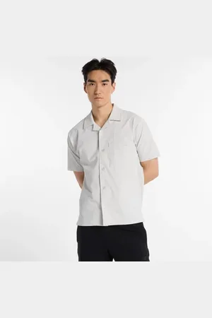 New Balance Heren Seersucker Button Up Short Sleeve, Maat L
