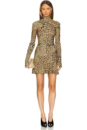 Norma Kamali Long Sleeve Turtleneck Fishtail Mini Dress in