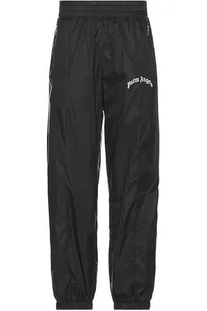 Palm Angels Curved Logo Nylon Track Pants in