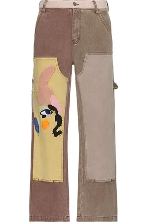 KIDSUPER STUDIOS Patchwork Face Double Knee Pants in