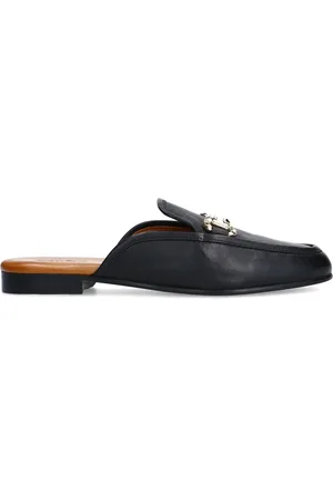 Sacha Zwarte leren slip on loafers met goudkleurige chain