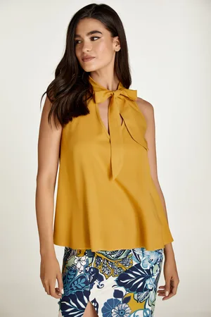 Conquista Mosterddetail mouwloze top