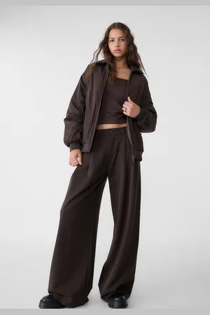 Stradivarius Nette broek met wijde pijpen en bandplooien 34