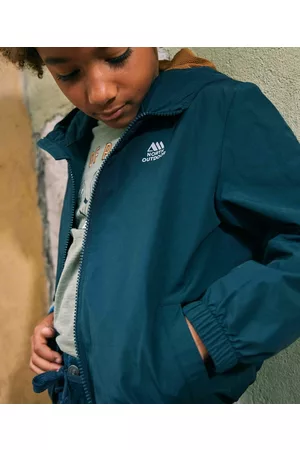 Tape a l'oeil Rugzakken - Marineblauwe blouson die transformeerbaar is naar een rugzak, voor jongens - 10 J