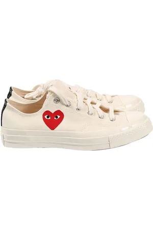 Comme des Garçons Chuck Taylor Small Red Heart Sneakers