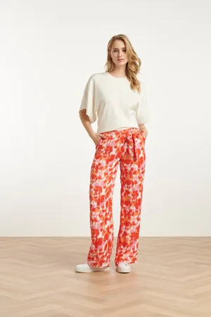 Smashed Lemon 25209 satijnen broek met peach bloemenprint |