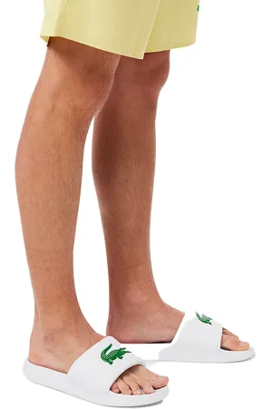 Lacoste Serve slide logo
