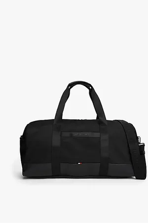 Tommy Hilfiger Reistas met metalen logo en crossbodyband