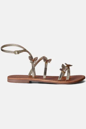 Les Tropéziennes par M Belarbi Orel Gouden Sandalen