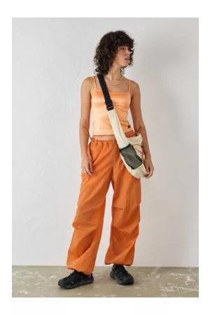 iets frans... Dames Broeken - Iets frans. Orange Shiny Baggy Tech Pants